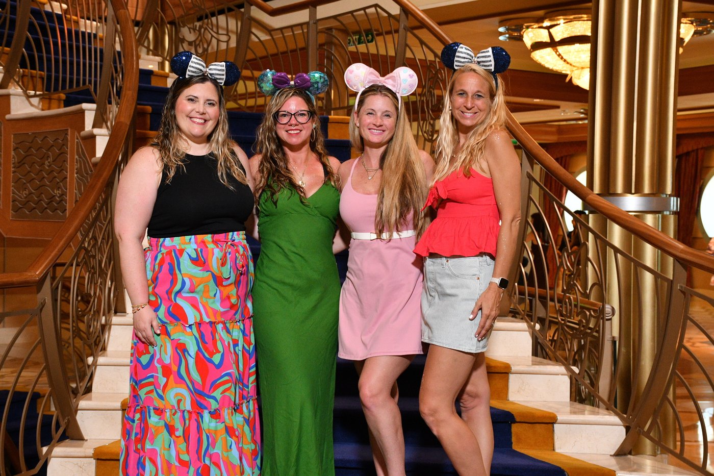 Magical Disney cruise staircase glowing in golden light