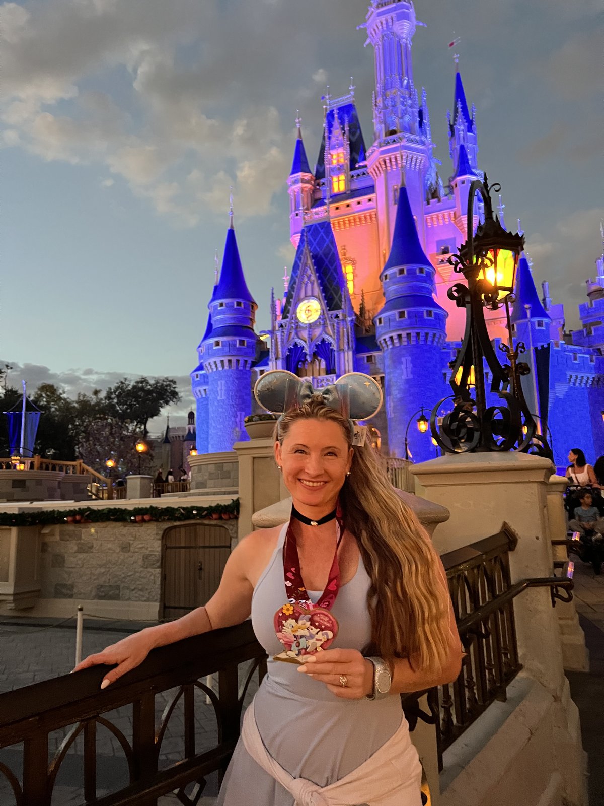 Sabrina running with runDisney character